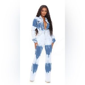 Long sleeve denim jumpsuit with the tags.